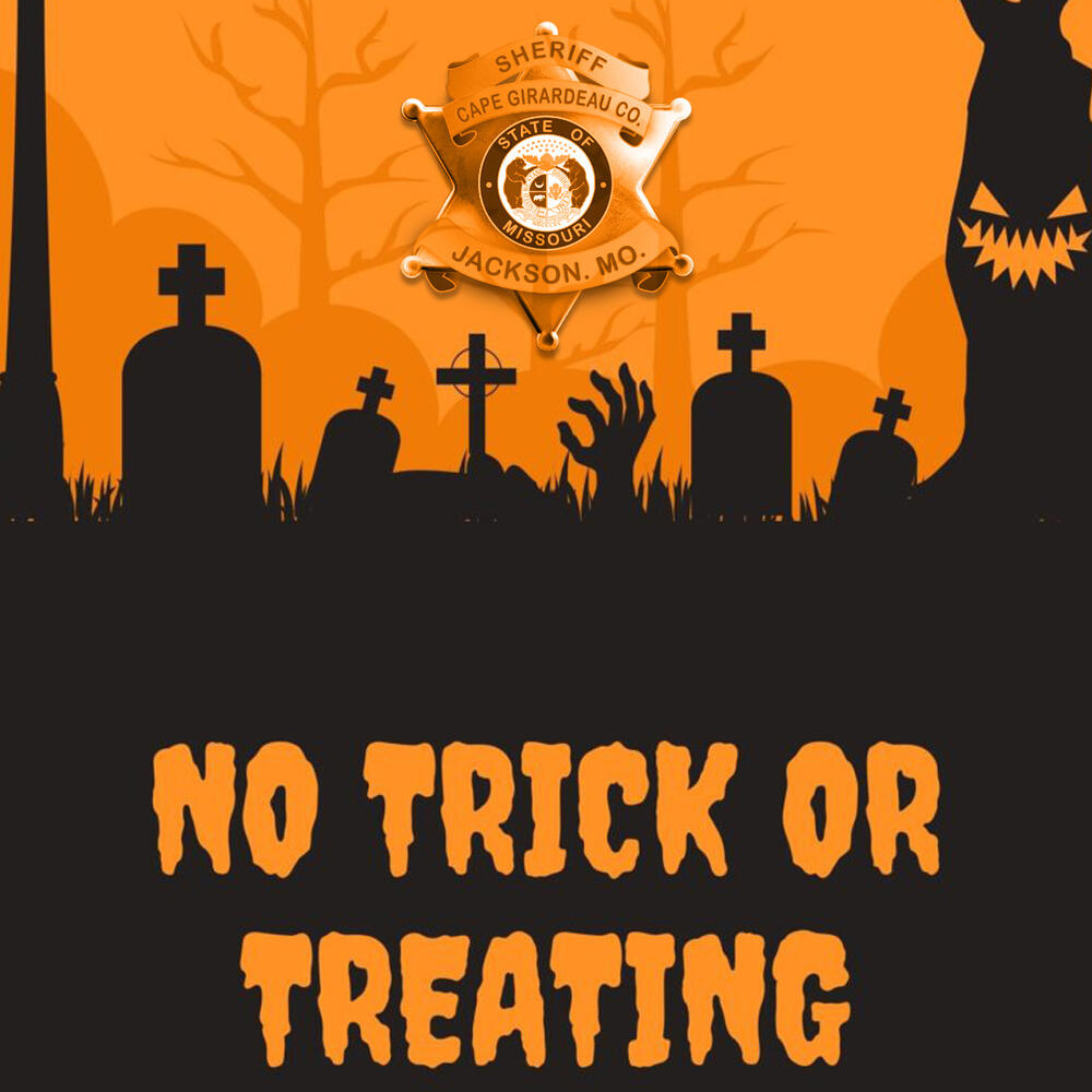 photo of Halloween decorations with words that say no trick or treating