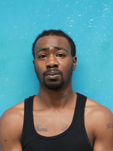 Mugshot of REID, TRESHON